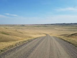 driving into the Frenchman Valley of Grasslands NP