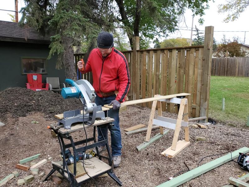 Henk working on the fence