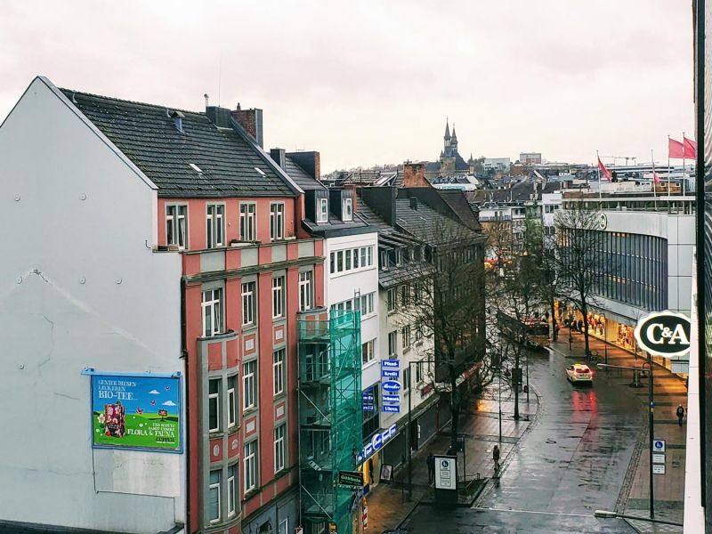 view from our room at Dom Apartments, you can see the city hall (looks like towers of a church)