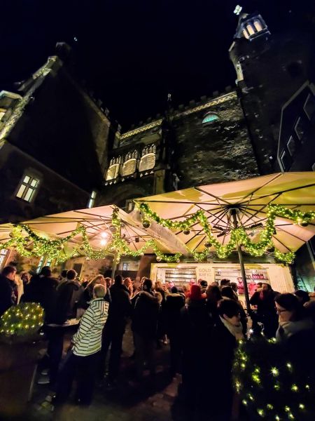 Having glühwein at the Ratskeller patio in Aachen