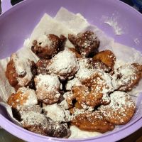 oliebollen on the left, apple beignets on the right