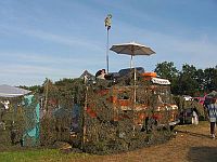 couch on top of a van on the campsite © Katalin Sipos
